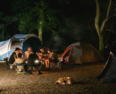 Family camping with Quechua tents pitched